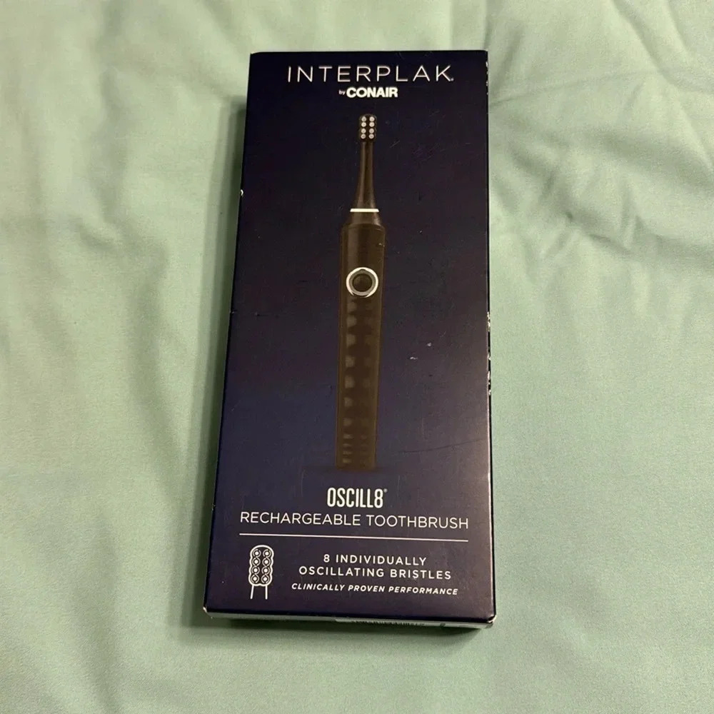 NIB Conair Oscilla8 rechargeable toothbrush